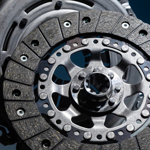 Spare part - clutch plate against black background